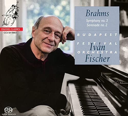 CD cover featuring a man sitting at a piano with text overlay.