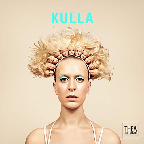 Woman with blonde hair and multiple small faces in curlers, against a beige background.