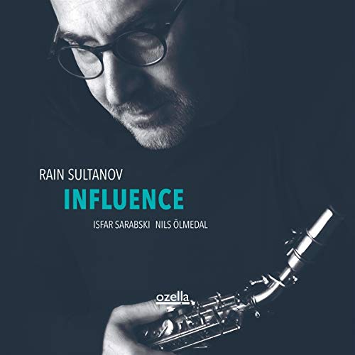 "CD cover featuring a man holding a saxophone, with 'Influence' written prominently."