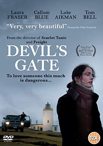 "DVD cover for 'Devil's Gate' featuring a woman standing by a lighthouse."
