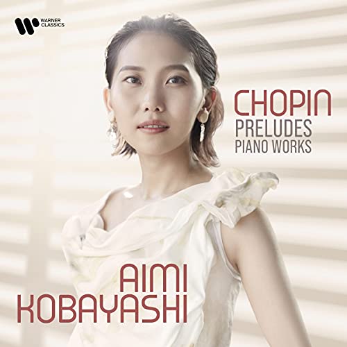 A woman in a white dress on a CD cover with text "Chopin Preludes Piano Works".