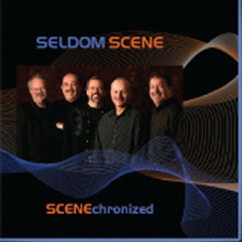 "CD cover featuring five men in dark clothing against a black background with wavy lines."