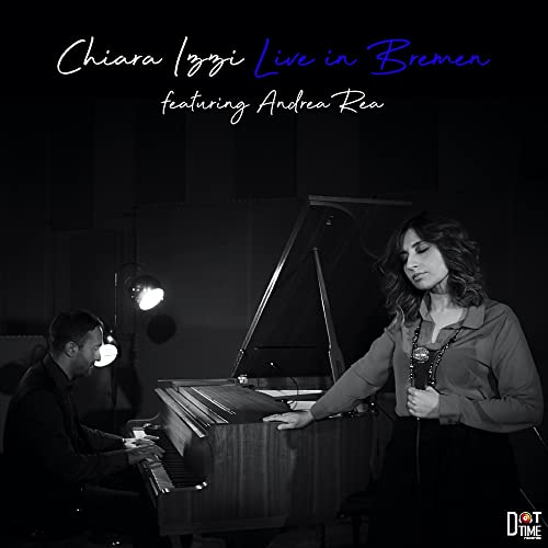 Black and white album cover featuring a pianist and a female vocalist.
