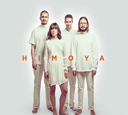 Four people in white clothing stand before the band name "HIMOY A".