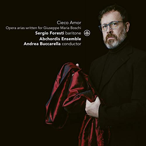 CD cover featuring baritone Sergio Foresti in a black suit and red fabric.