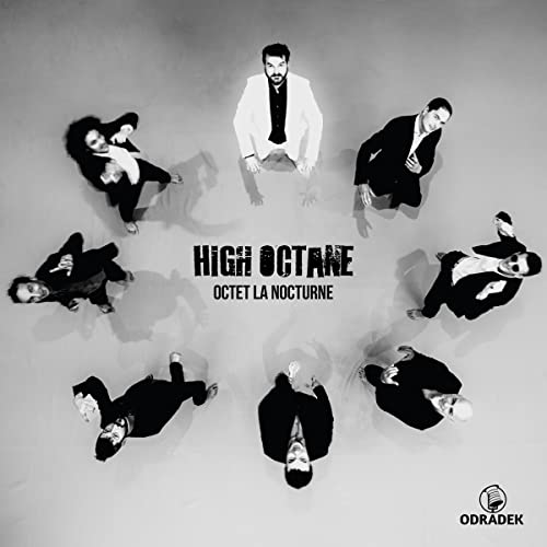 Black and white album cover featuring seven men in various poses.