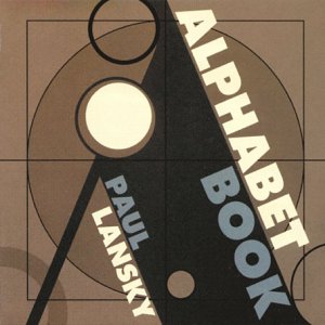 The image depicts a CD cover for "Hannah Mackay - Alphabet Book". For accessibility purposes, a suitable alt text could be: "Brown CD cover with black triangle and 'Alphabet Book' text."