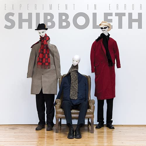 CD cover featuring three mannequins in coats and scarves.