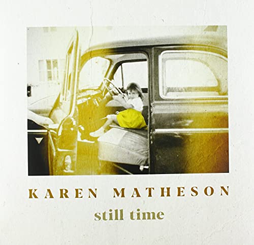 Vintage photo of a child in a car, album cover for Karen Matheson.