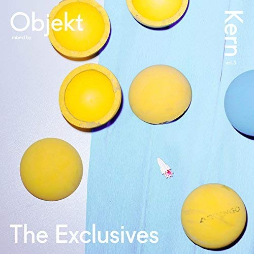 "Album cover with yellow and blue spheres on a split white and blue background."