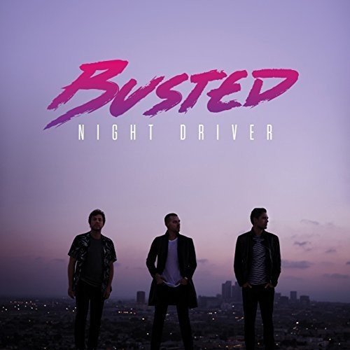 "Album cover featuring three men standing against a city skyline at dusk."
