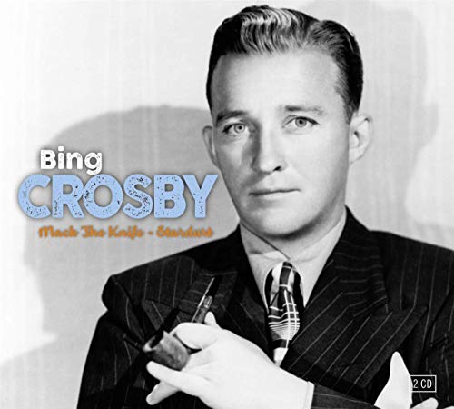 Black and white portrait of Bing Crosby in a pinstripe suit.