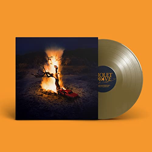 Vinyl record with album art depicting a burning car and landscape.
