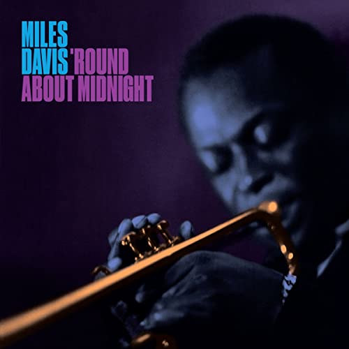 Miles Davis album cover featuring a portrait of him playing trumpet.
