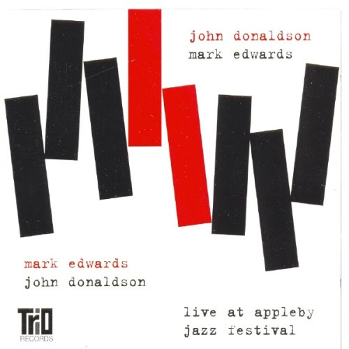 "Album cover with abstract black and red rectangles on white background, featuring artist names."