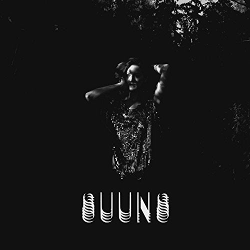 Black and white album cover featuring a person and stylized band name.