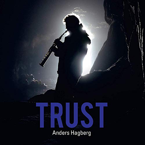 "Album cover with silhouette of a man playing clarinet, 'TRUST' in blue text."