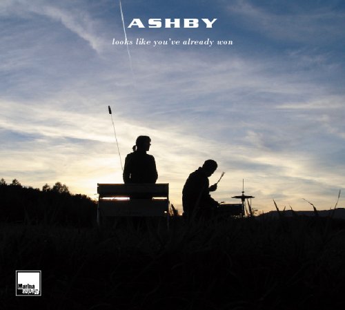 "Album cover with silhouetted figures against a cloudy sky, 'ASHBY' and 'looks like you've already won'."