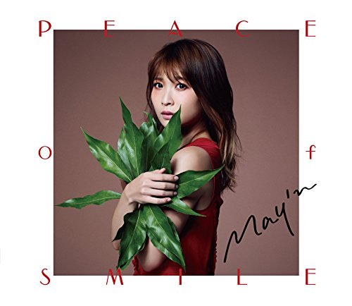 CD cover featuring a woman with leaves, text arranged around the image.