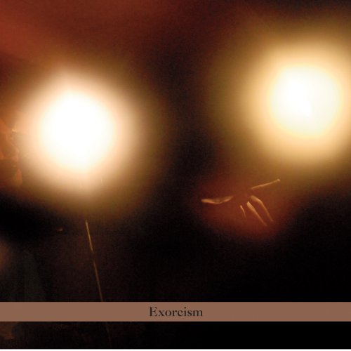 "CD cover with two glowing orbs and 'Exorcism' text on a dark background."