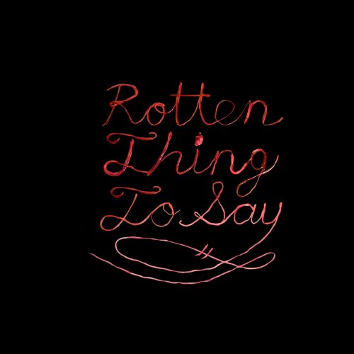 "Album cover with 'Rotten Thing to Say' in orange cursive text on a black background."