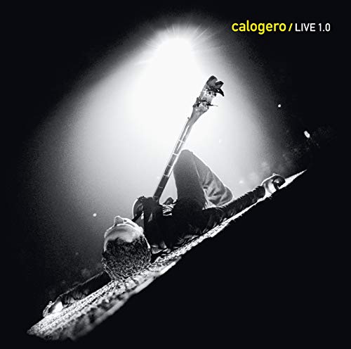 Black and white album cover featuring a musician with a bass guitar.