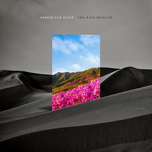 CD cover for Armor for Sleep’s “The Rain Museum” with desert and sky imagery.
