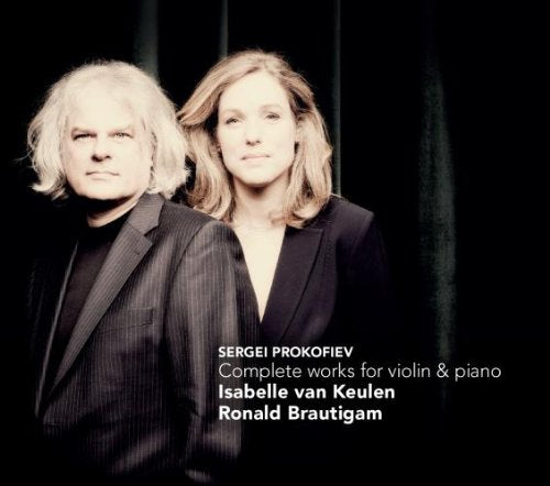 CD cover with man and woman in dark clothing against a black background.