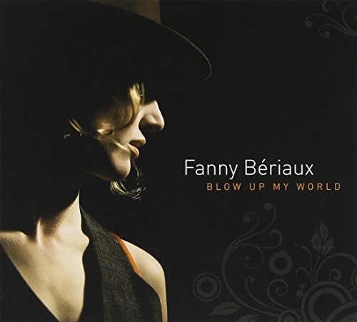 Album cover featuring a woman in a hat against a black background with floral design.
