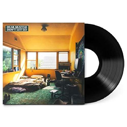 "Vinyl record cover with a messy bedroom scene and partially visible black vinyl."