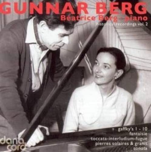 Black and white photo of a man and woman with a piano.