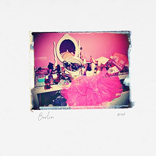 Album cover for Clint Mansell’s “Berlin” featuring a pink, doll-filled scene.