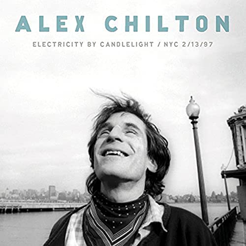 Black and white album cover featuring Alex Chilton looking upwards, NYC skyline.