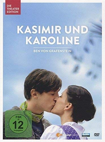 "DVD cover showing a young couple kissing with blue sky and birds in background."