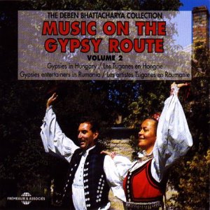 CD cover featuring two dancers in traditional clothing, with red text.