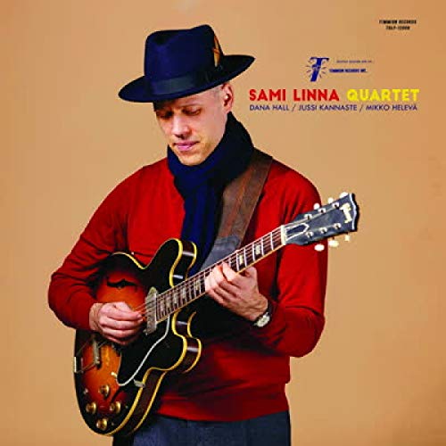 Man with guitar wearing a hat, album cover for Sami Linna Quartet.