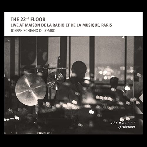 CD cover for “The 22nd Floor” by Joseph Schiano Di Lombo, featuring a drummer.