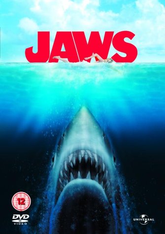Jaws" DVD cover: a great white shark breaches toward a swimmer.