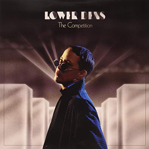Album cover for Lower Dens’ “The Competition” featuring a portrait of a person.