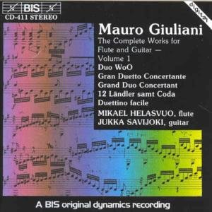 CD cover with sheet music background and white text, black border, and Amazon logo.