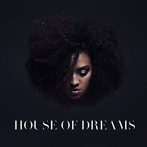 A woman with curly hair and the text "HOUSE OF DREAMS" on a dark background.