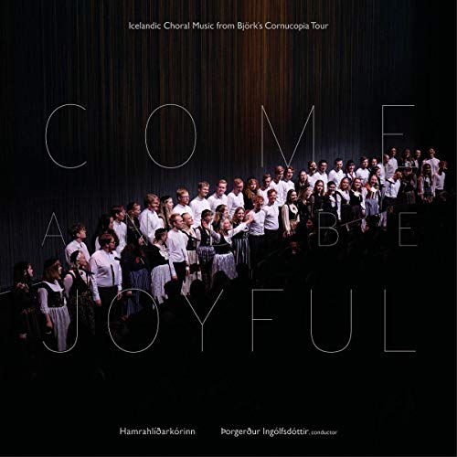 "CD cover with a large choir on stage, 'COME AND BE JOYFUL' text overlay."