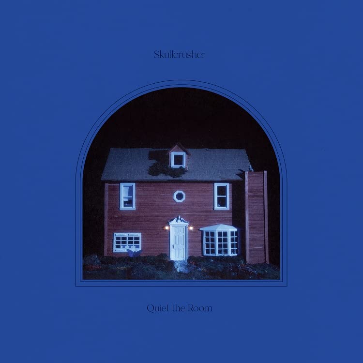 Blue album cover featuring a miniature, illuminated house within an arch.