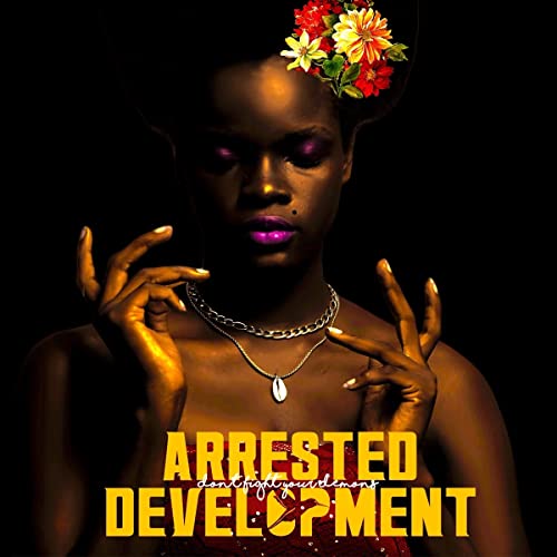 Vinyl album cover featuring a dark-skinned woman with flowers in her hair.