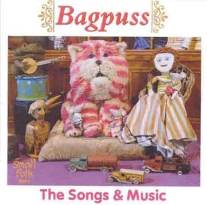 "Album cover for 'Bagpuss: The Songs & Music' featuring a cat and doll."