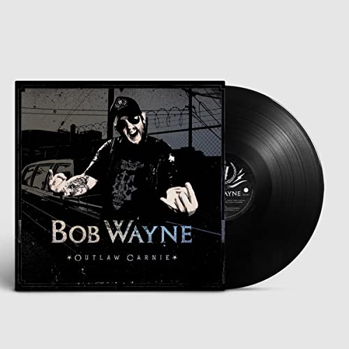 Bob Wayne “Outlaw Carnie” vinyl record with a man in a cap.