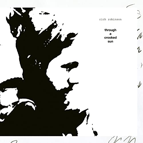 Rich Robinson's album cover with black silhouette on white background, signed.