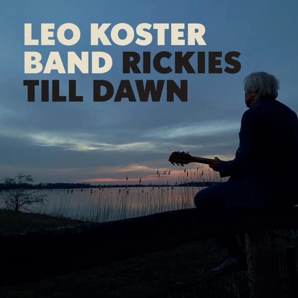 CD cover: musician with guitar silhouetted against a sunset landscape.