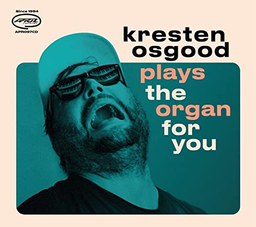CD cover featuring a man with a beard wearing sunglasses.