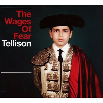 "Album cover with a young man in ornate matador attire against a dark background."